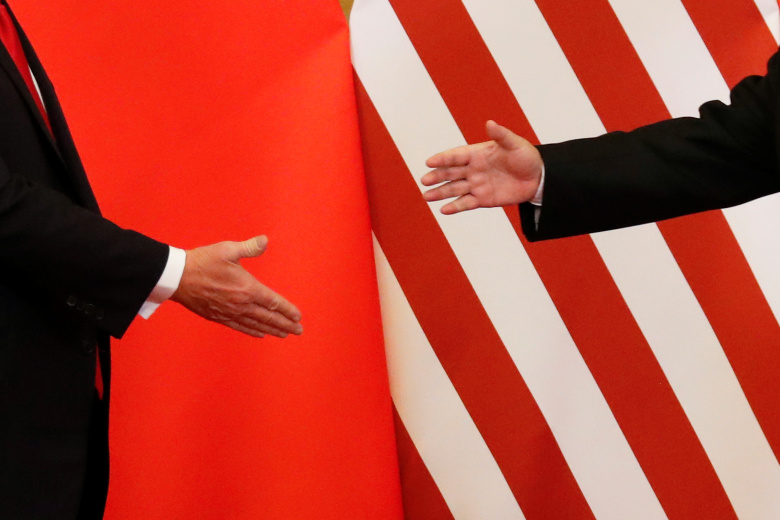 Рукопожатие Дональда Трампа и Си Цзиньпина. Фото: Damir Sagolj / Reuters
