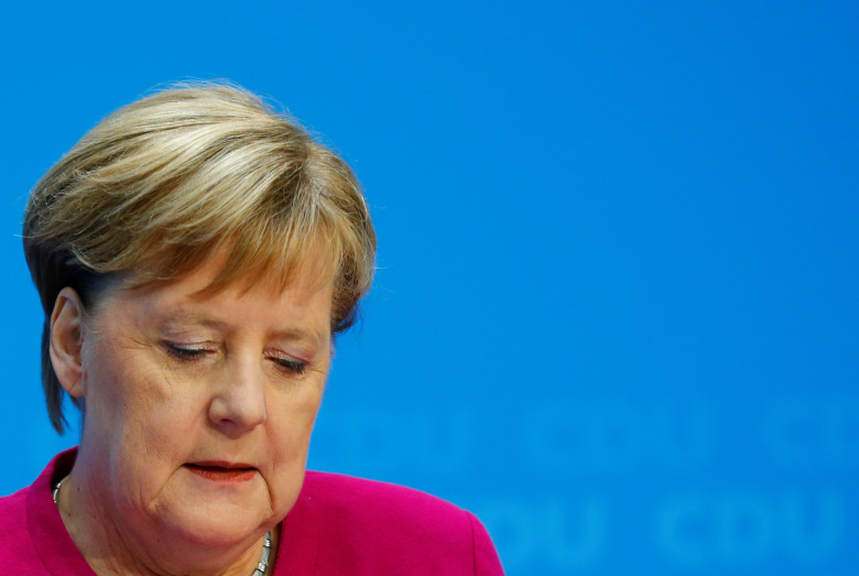 Ангела Меркель говорит о своем уходе из ХДС. Фото: Hannibal Hanschke / Reuters