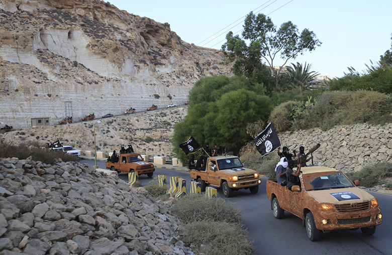 Предположительно боевики ИГИЛ (запрещена в России). Ливия, 2014 год. Фото: Reuters