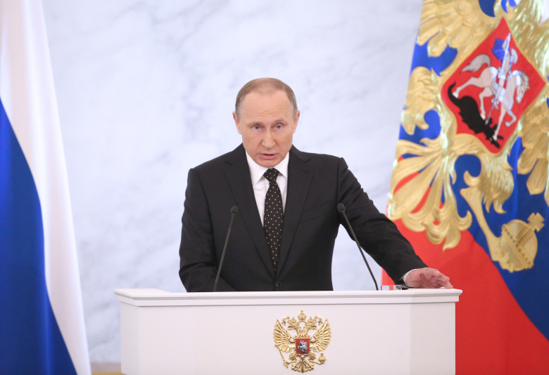 Президент России Владимир Путин во время выступления с ежегодным посланием к Федеральному Собранию РФ в Кремле