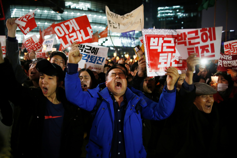 Акция протеста призывает президента Южной Кореи Пак Кын Хе уйти в отставку, Сеул. Фото: Kim Hong-Ji / Reuters
