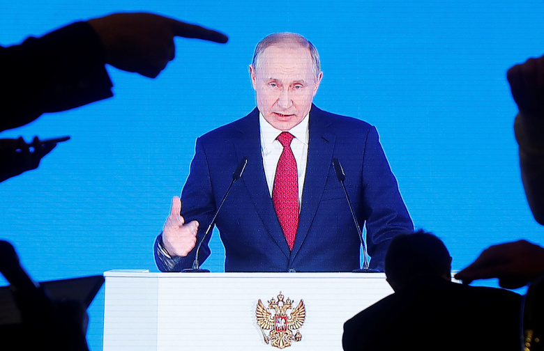 Владимир Путин во время Послания Федеральному собранию. Фото: Maxim Shemetov / Reuters
