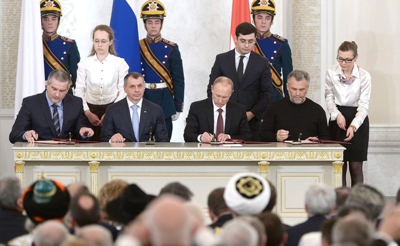 Подписание договора о принятии Республики Крым в Российскую Федерацию, 2014 год. Фото: kremlin.ru