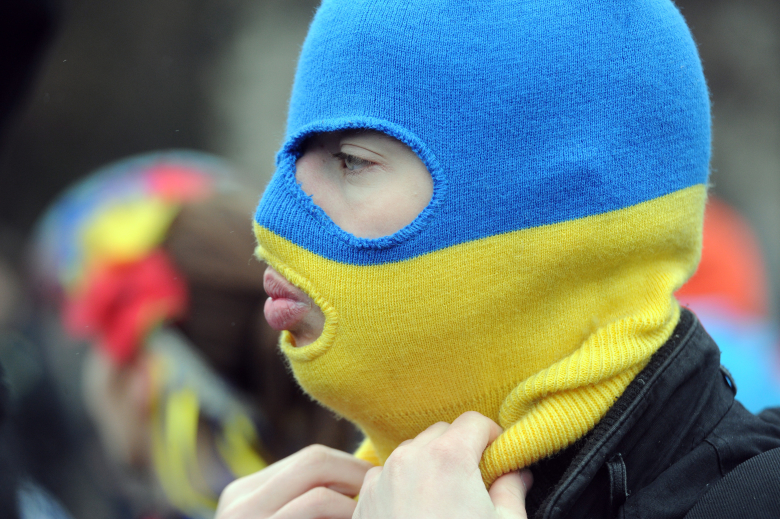 Сторонник территориальной целостности Украины во время митинга у памятника Тарасу Шевченко.