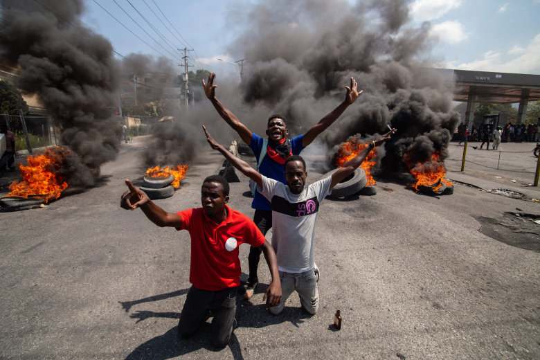 Реакция гаитян на отставку премьер-министра Генри. Порт-о-Пренс, Гаити, 12 марта 2024 года