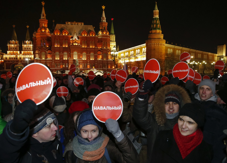Сторонники Алексея Навального на митинге против судебного приговора на Манежной площади 30 декабря 2014 года. Фото: Tatyana Makeyeva / Reuters