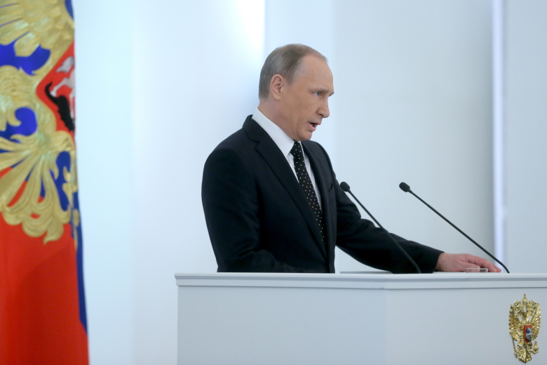 Президент России Владимир Путин во время выступления с ежегодным посланием Федеральному cобранию РФ в Кремле.