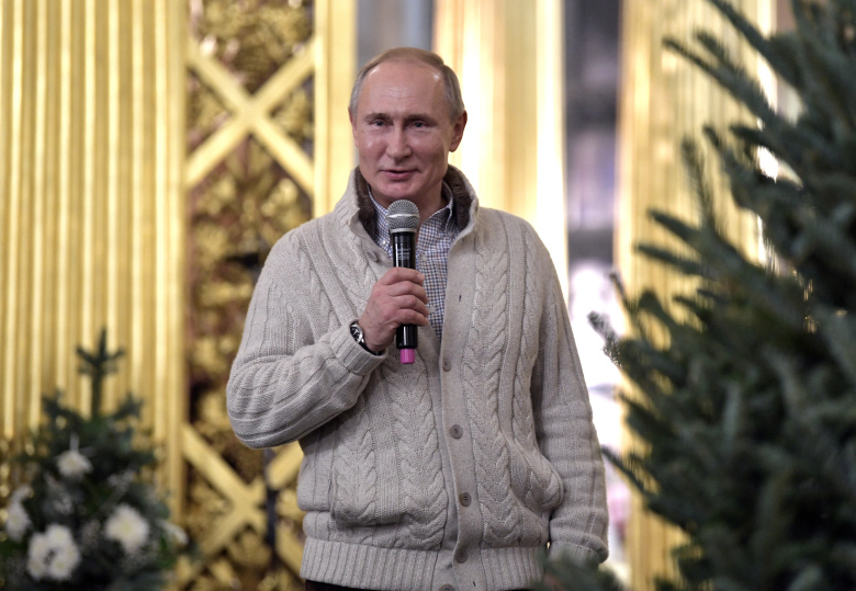 Владимир Путин после рождественской службы. Фото: Alexei Nikolsky / Reuters