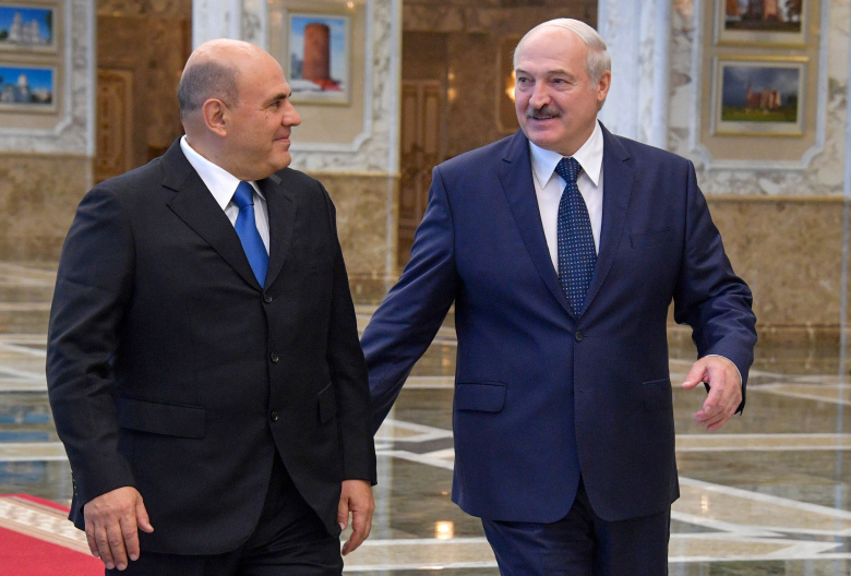 Михаил Мишустин и Александр Лукашенко во время встречи во Дворце Независимости. Фото: Александр Астафьев /ТАСС