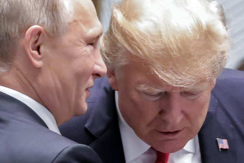 Владимир Путин и Дональд Трамп.  Фото: Mikhail Klimentyev / SPUTNIK / AFP