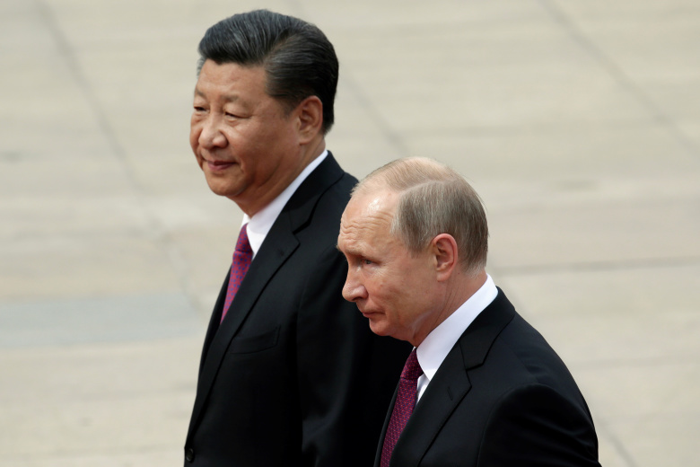 Си Цзиньпин и Владимир Путин. Фото: Jason Lee / Reuters