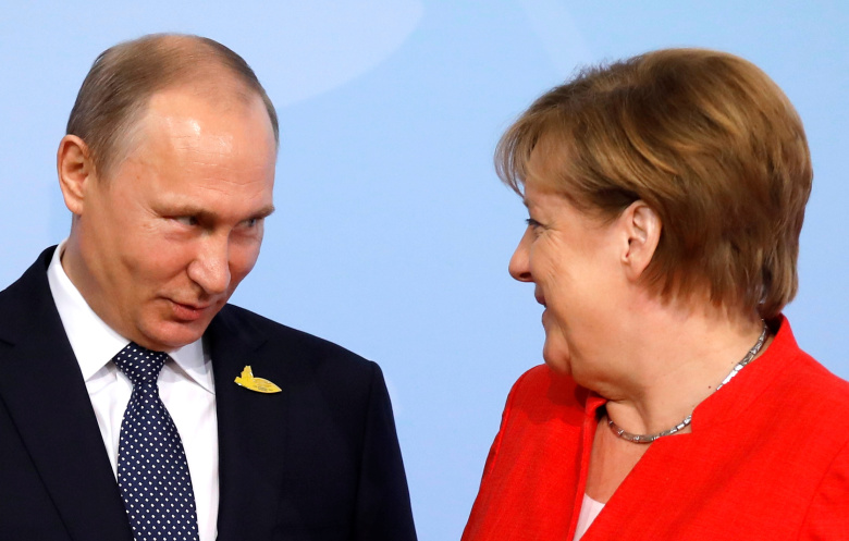 Владимир Путин и Ангела Меркель, 2017 год. Фото: Carlos Barria / Reuters
