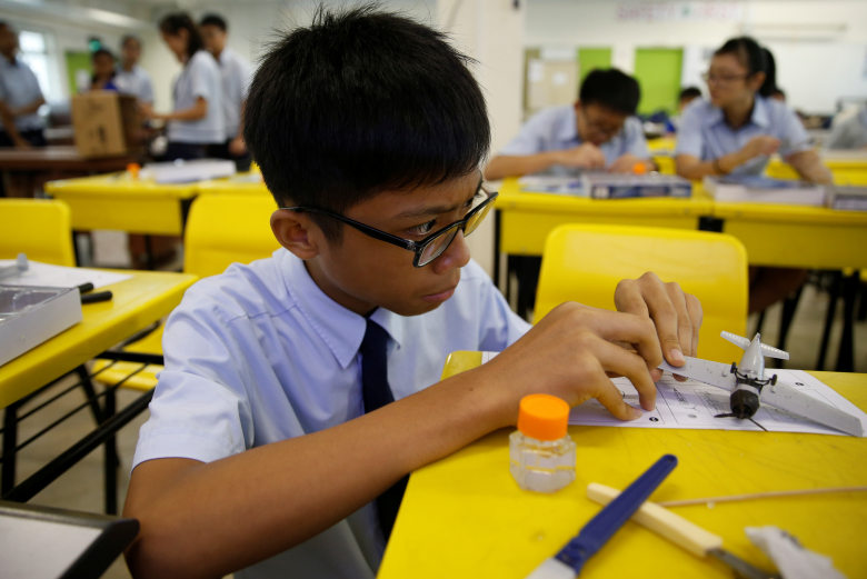 Ученик сингапурской школы. Фото: Edgar Su / Reuters