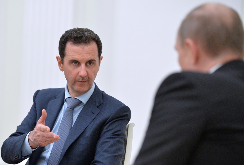 Башар Асад и Владимир Путин во время встречи в Кремле.