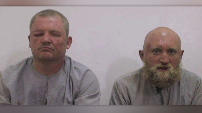 Скриншот видео с захваченными в плен Романом Заболотным и Григорием Цуркану. Фото: youtube.com