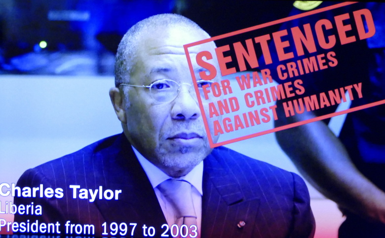 Бывший президент Либерии Чарльз Тейлор. Приговорен к 50 годам тюремного заключения за военные преступления и преступления против человечности