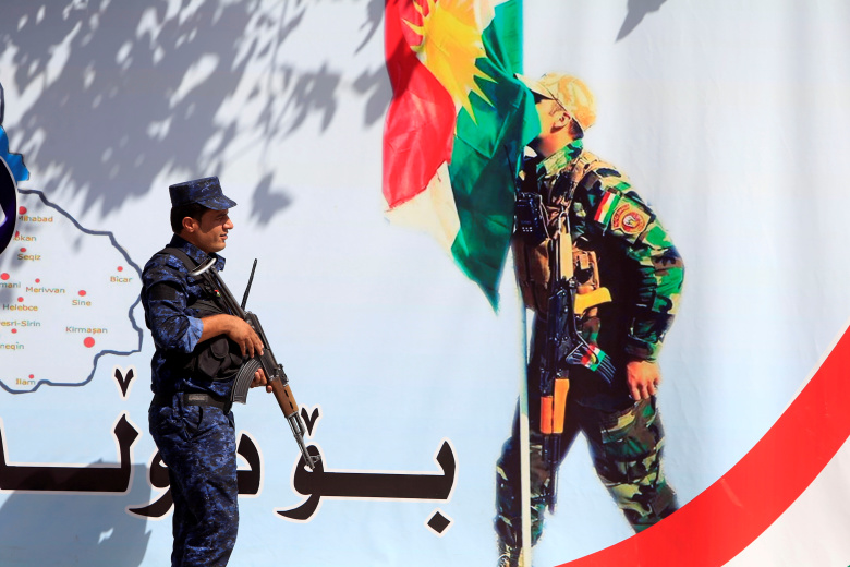 Плакат с призывом приходить на референдум о независимости Курдистана. Эрбиль, Ирак. Фото: Alaa Al-Marjani / Reuters
