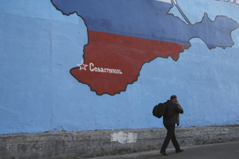 Граффити на стене в Москве. Фото: Artur Bainozarov / Reuters