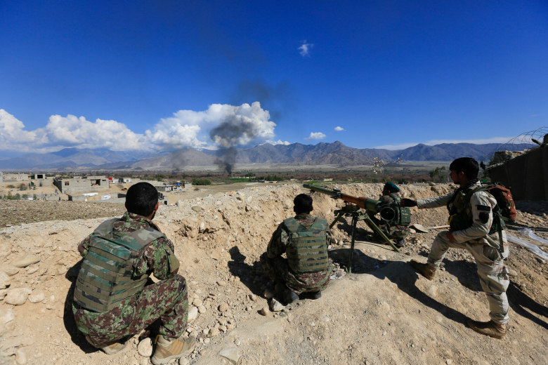 Перестрелка между талибами и афганскими силами безопасности в провинции Лагман, Афганистан. Фото: Parwiz Parwiz / Reuters