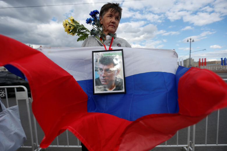Акция памяти Бориса Немцова. Фото: Maxim Zmeyev / Reuters