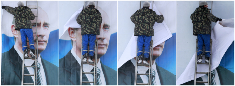 Плакат на улице Москвы, 2012 год. Фото: Eduard Korniyenko / Reuters
