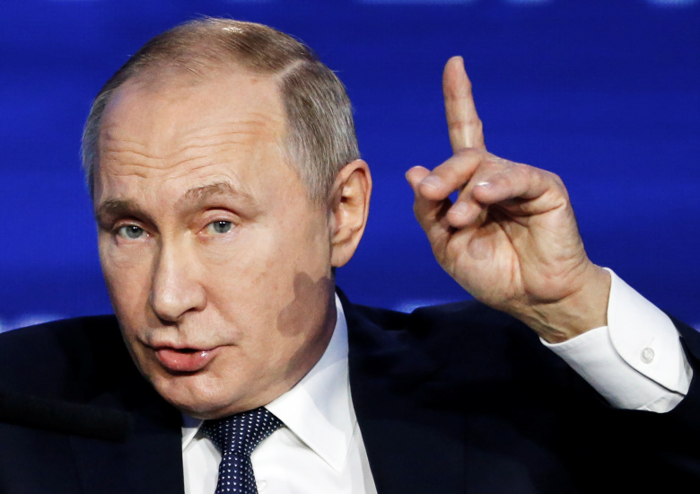 Владимир Путин на форуме "Россия зовет!" говорил и об Украине. Фото: Alexander Zemlianichenko/Pool via REUTERS