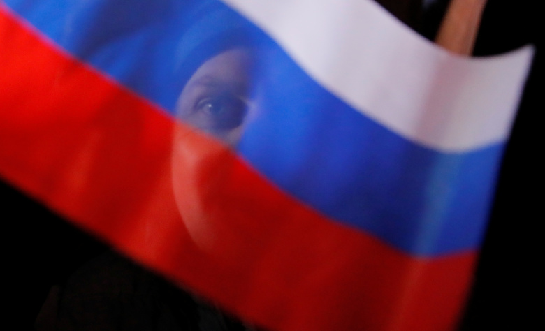 Митинг в честь присоединения Крыма к России. Фото: Maxim Shemetov / Reuters