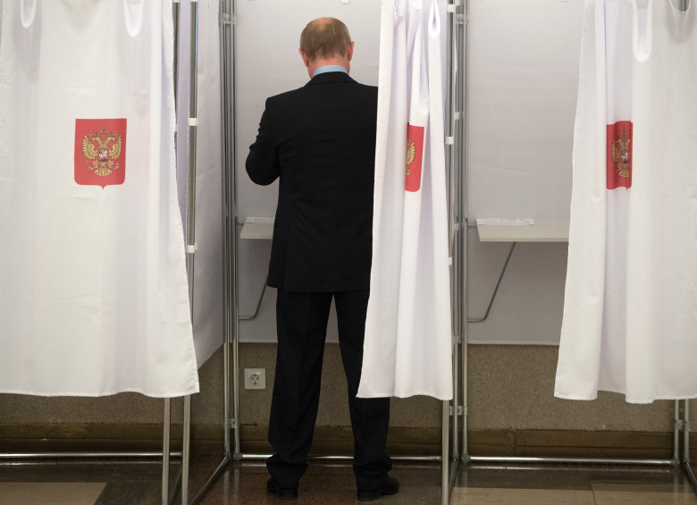Владимир Путин в единый день голосования. Фото: Сергей Гунеев / РИА Новости