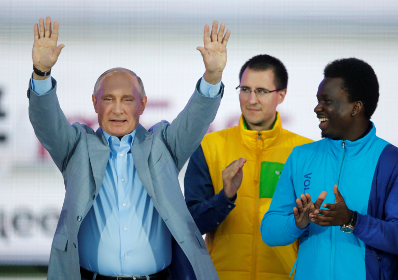 Владимир Путин на  XIX Всемирном фестивале молодёжи и студентов в Сочи. Фото: Alexander Zemlianichenko / Reuters