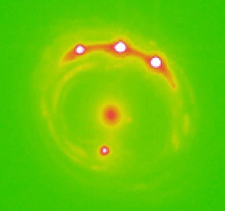 4 видимых на Земле изображения квазара RX J1131-1231. Фото: University of Oklakhoma