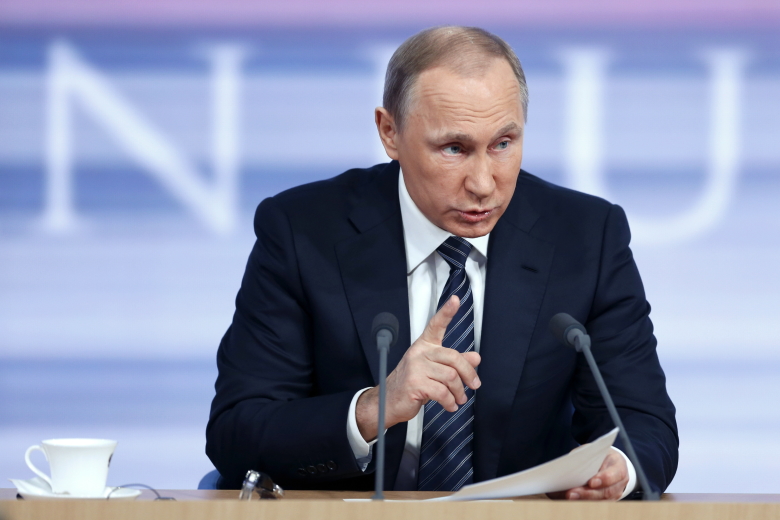 Президент России Владимир Путин во время пресс-конференции в Центре международной торговли.