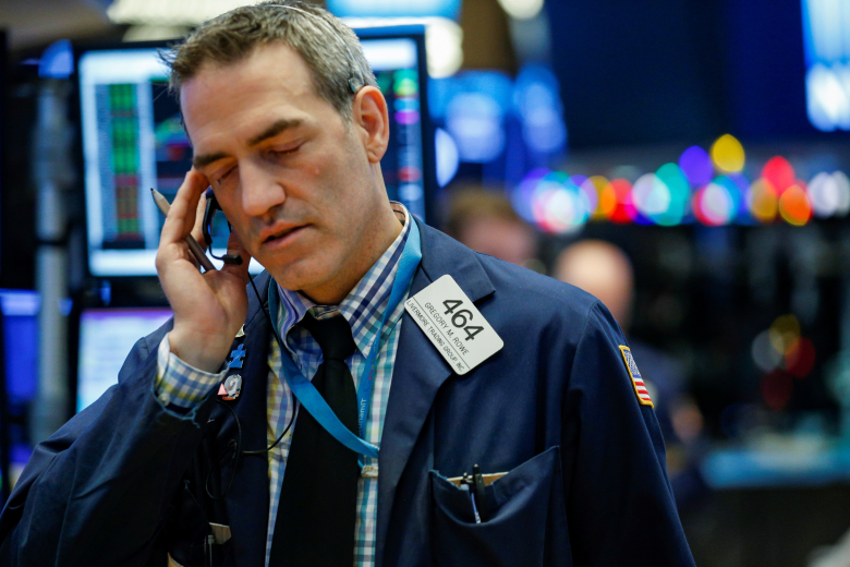 Трейдер Нью-Йоркской фондовой биржи. Фото: Brendan McDermid / Reuters